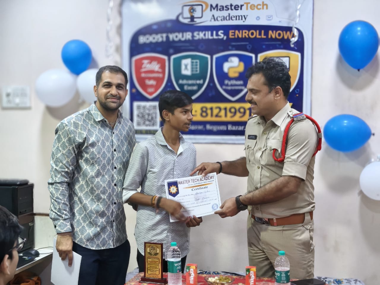 Student receiving certificate at Master Tech Academy Plus